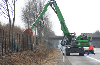 Sennebogen 718 with mulcher attachment